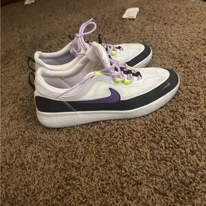 Nyjah Nike White Sneakers with Purple Swoosh and Black Trim
